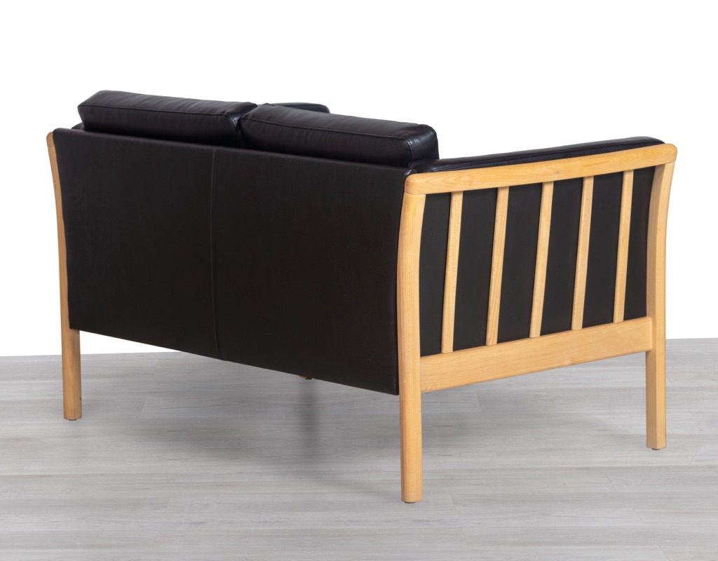 Danish Sofa Couch Vintage Black Leather Two Seater Beechwood Frame Stubby Skipper Mogens Hansen 1960s Imported Scandinavian Seating Back View