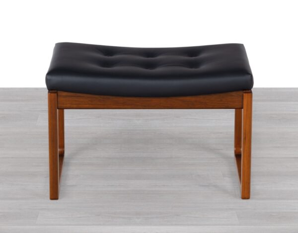 Iconic Australian mid century 1960s sleigh leg footstool by Gerald Easden for Module in Blackwood new black leather upholstery occasional table