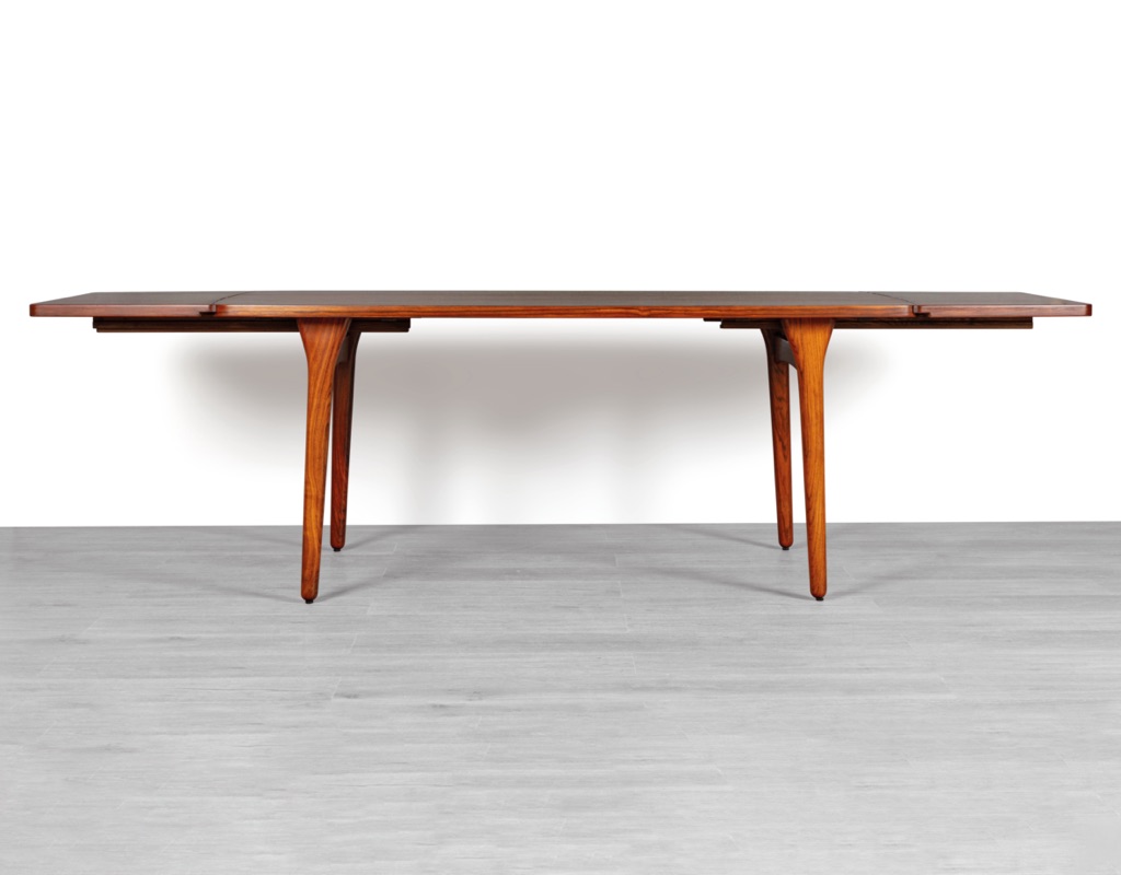 Mid century modern Henning Kjaernulf dining table Bruno Hansen Mobelfabrik Danish 1960s Brazilian Rosewood extension leaves boat shape organic legs