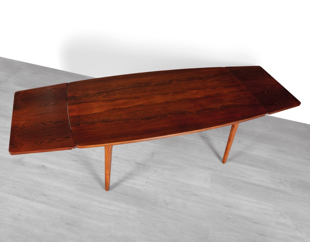 Mid century modern Henning Kjaernulf dining table Bruno Hansen Mobelfabrik Danish 1960s Brazilian Rosewood extension leaves boat shape highly figured