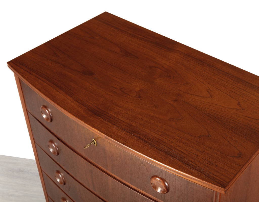 Mid century modern Kai Kristiansen chest of drawers tallboy Danish 1960s teak bow front oak legs original imported Scandinavian bedroom furniture top view