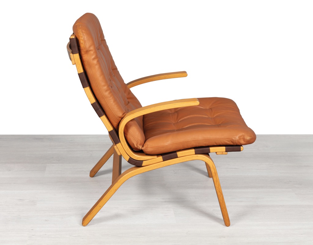 Mid century modern armchair Farstrup Mobler bentwood beech leather chair Danish vintage original Scandinavian design patina tan leather lounge room furniture seating side view curved arms 1970