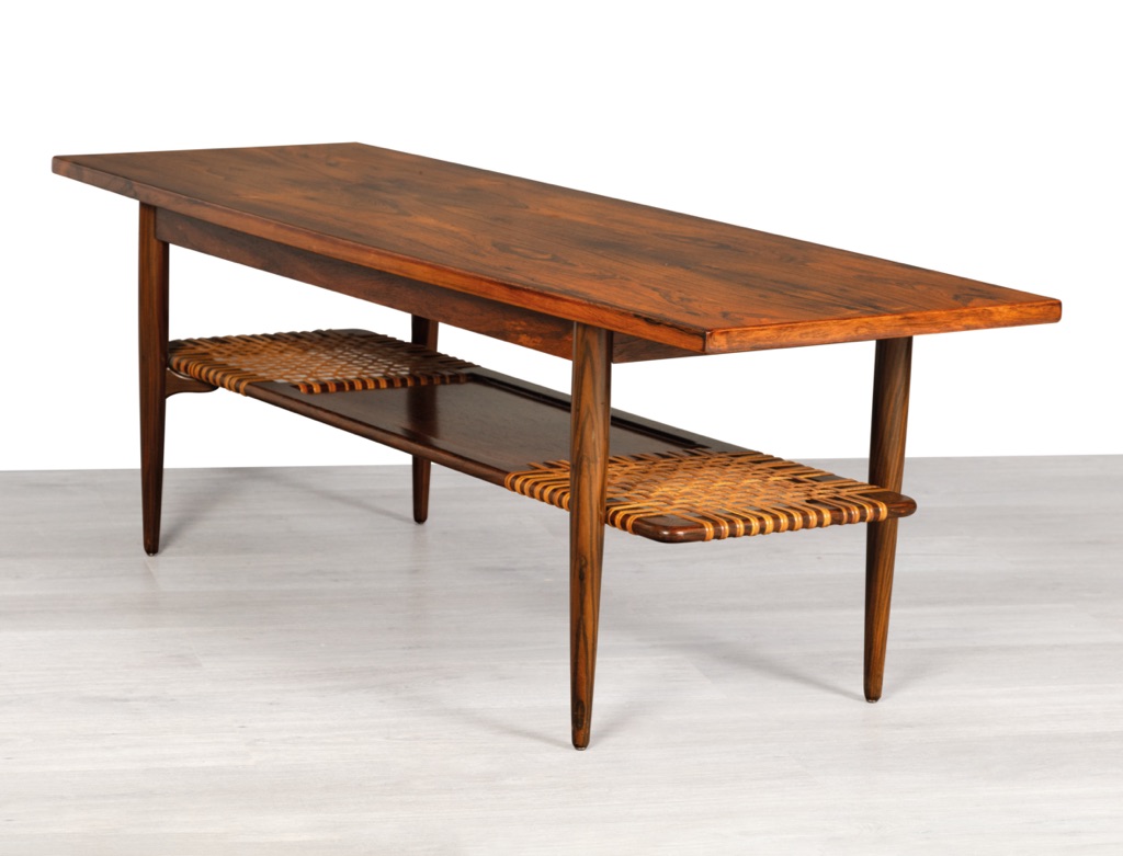 Mid century modern Danish coffee table vintage Scandinavian Brazilian rosewood rattan shelf 1960s side view