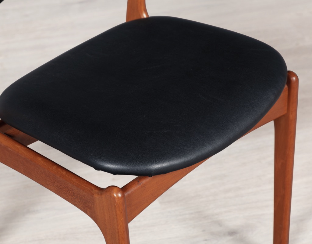 Mid century modern Danish Erik Buch Model 49 dining chair by O.D. Mobler Oddense Mobelfabrik teak frame floating seat design leather seats original vintage Scandinavian designed furniture frame close up