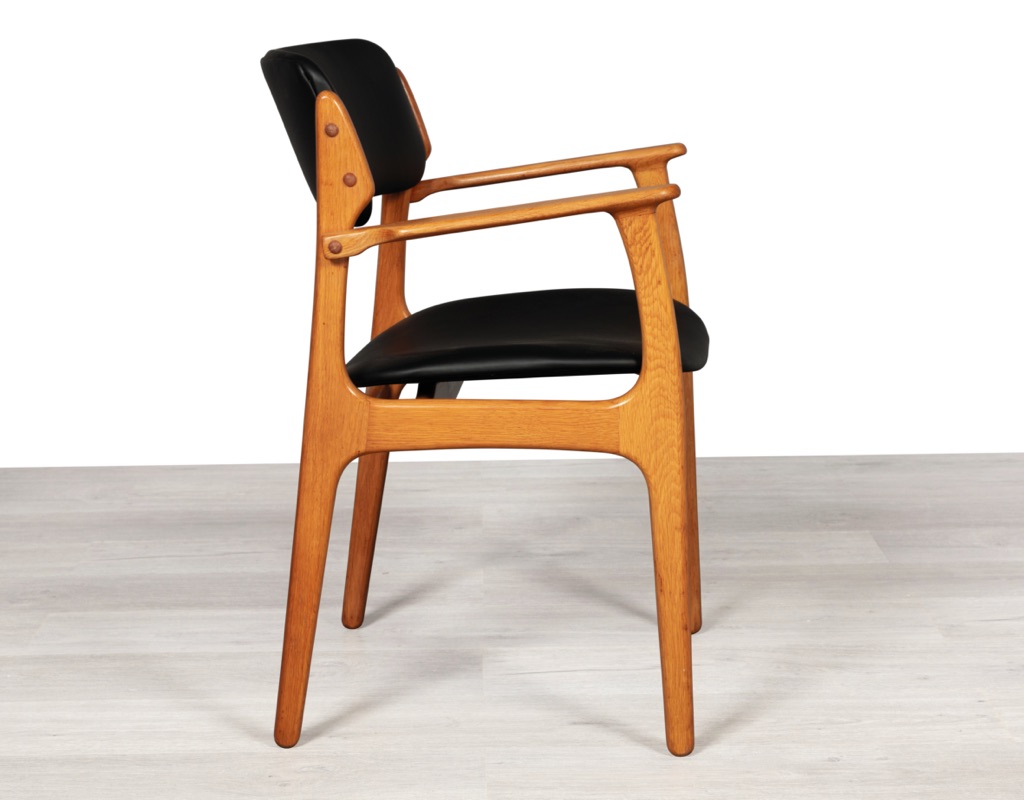 Mid century modern Erik Buch Model 49 dining chairs Danish vintage 1960 seating O.D. Mobler Oddense Mobelfabrik European oak leather set of eight carver armchairs side view