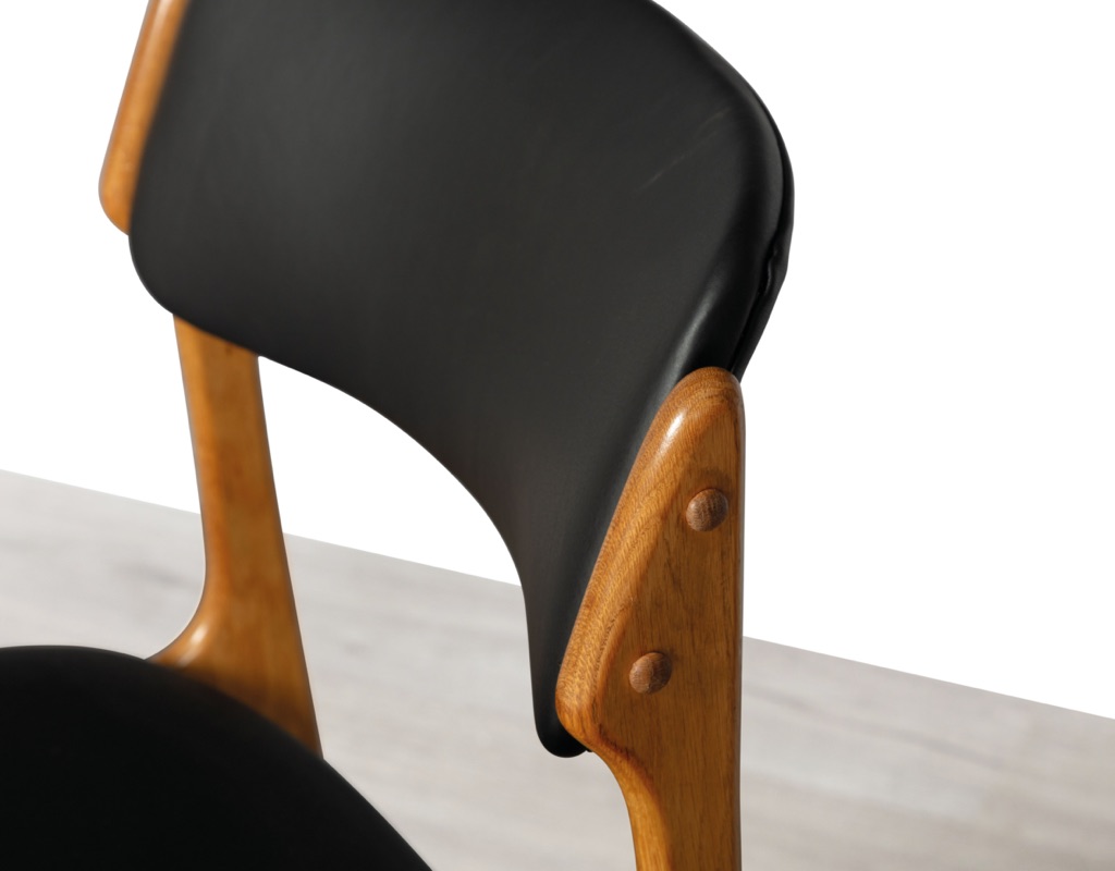 Mid century modern Erik Buch Model 49 dining chairs Danish vintage 1960 seating O.D. Mobler Oddense Mobelfabrik European oak leather set of eight carver armchairs close up