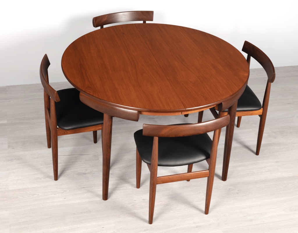 Mid century modern Hans Olsen Roundette Dining Setting Frem Rojle Denmark 1950 teak butterfly extension leaf original imported Scandinavian Danish design chairs away from the table