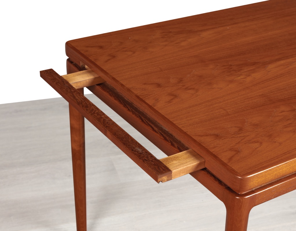 Mid century modern Johannes Andersen dining table by Christian Linnebergs Mobelfabrik Danish vintage 1960s extension teak table with concealed leaves Denmark Scandinavian support