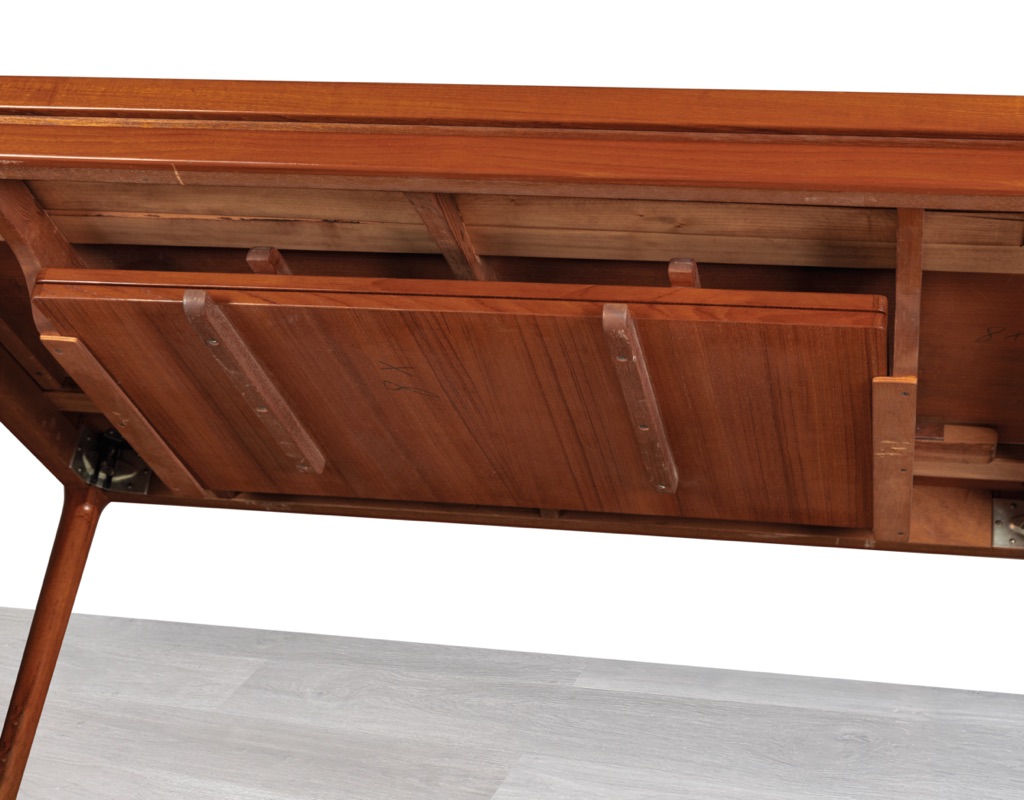 Mid century modern Johannes Andersen dining table by Christian Linnebergs Mobelfabrik Danish vintage 1960s extension teak table with concealed leaves Denmark Scandinavian stored underneath