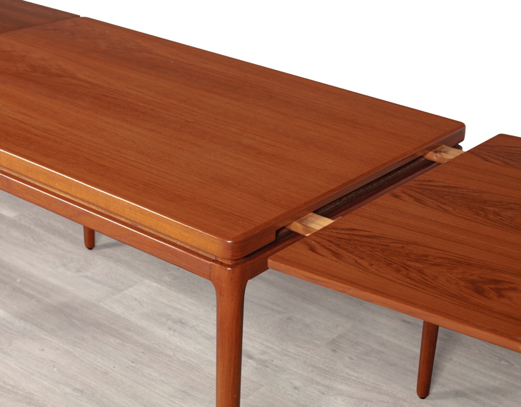 Mid century modern Johannes Andersen dining table by Christian Linnebergs Mobelfabrik Danish vintage 1960s extension teak table with concealed leaves Denmark Scandinavian pull out