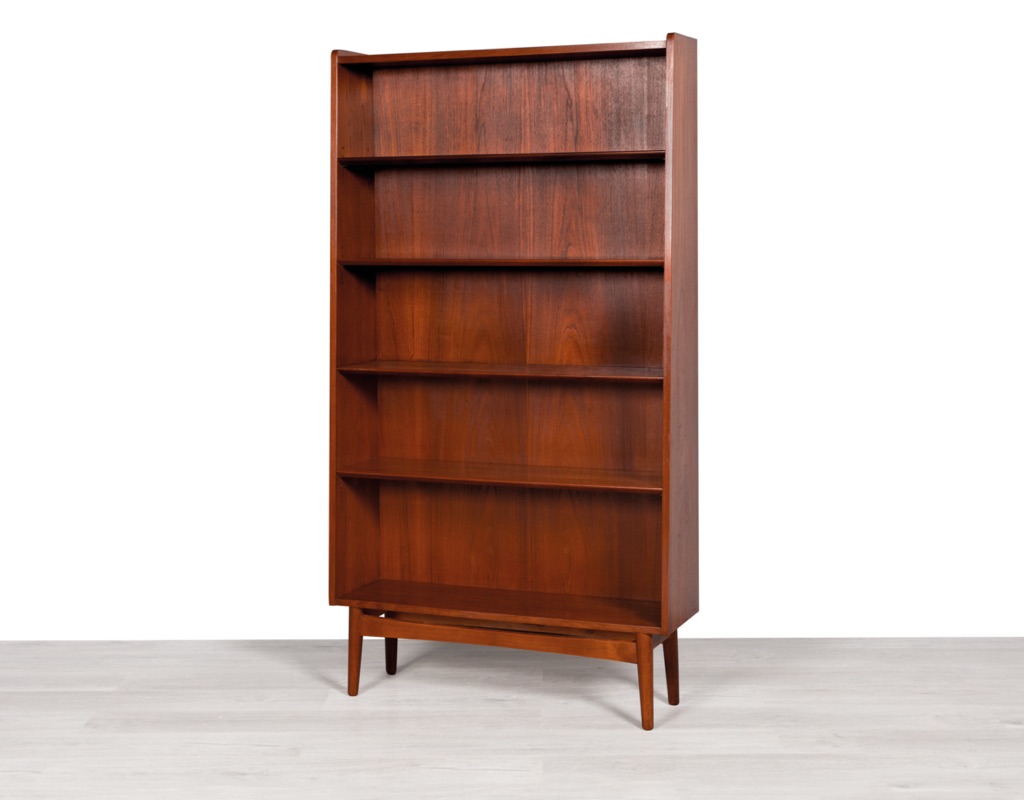 Mid century modern bookshelf by Johannes Sorth for Nexo Mobelfabrik in Denmark 1960s in teak conical shape Scandinavian vintage shelving on legs