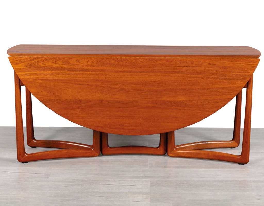Mid century modern Danish drop leaf dining table by Peter Hvidt & Orla Molgaard Nielsen For France & Son Denmark 1950s solid teak top oval design gate leg organic shape brass detail