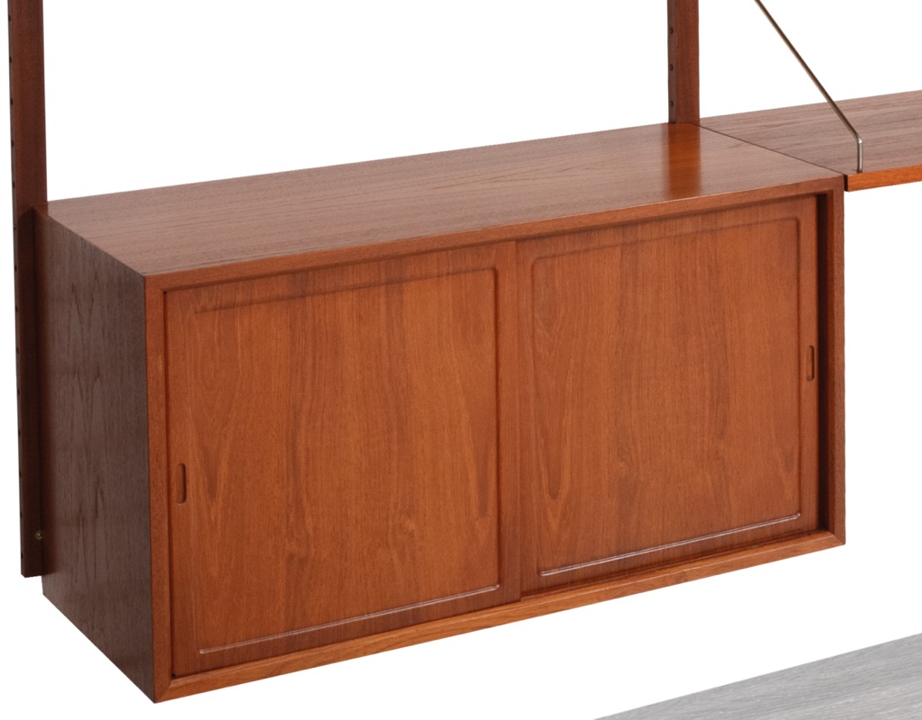 Mid century modern Poul Cadovius Royal shelving system by CADO Denmark 1950 modular wall mounted shelving unit in teak imported original Scandinavian design for storage cabinet