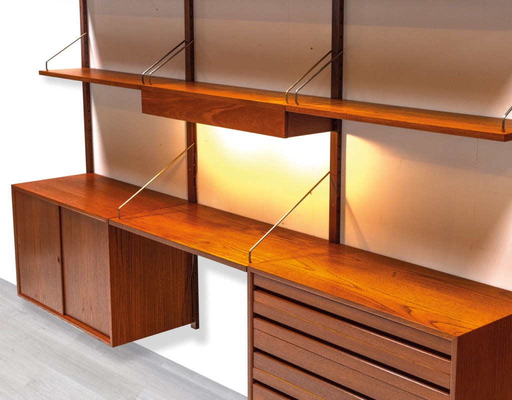 Mid century modern Poul Cadovius Model Royal Shelving System Danish vintage 1950s wall mounted shelving system bookshelf brass supporting arms Scandinavian design light in the middle original