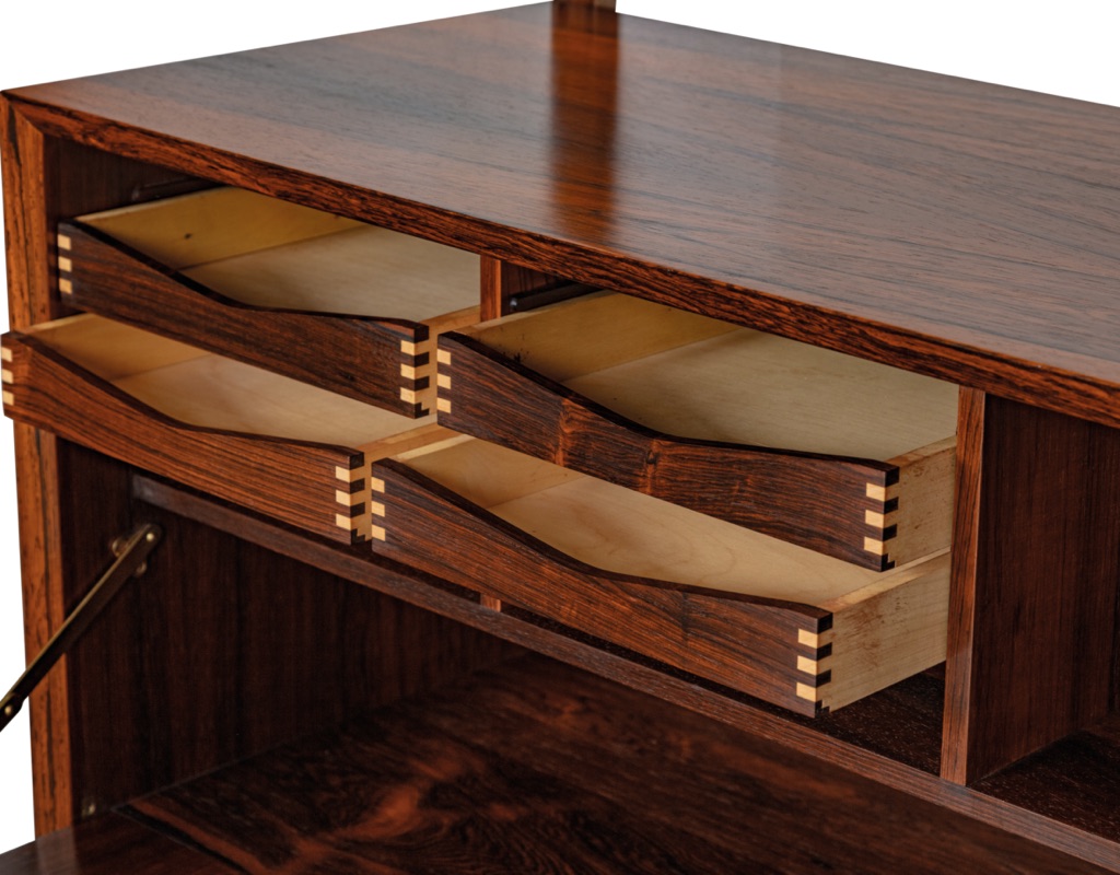 Mid century modern Poul Cadovius Danish shelving system vintage Brazilian Rosewood wall mounted 1960 Denmark Kurt Ostervig Peter Sorensen bookshelf storage Kai Kristiansen modular Scandinavian original design bureau secretaire close up