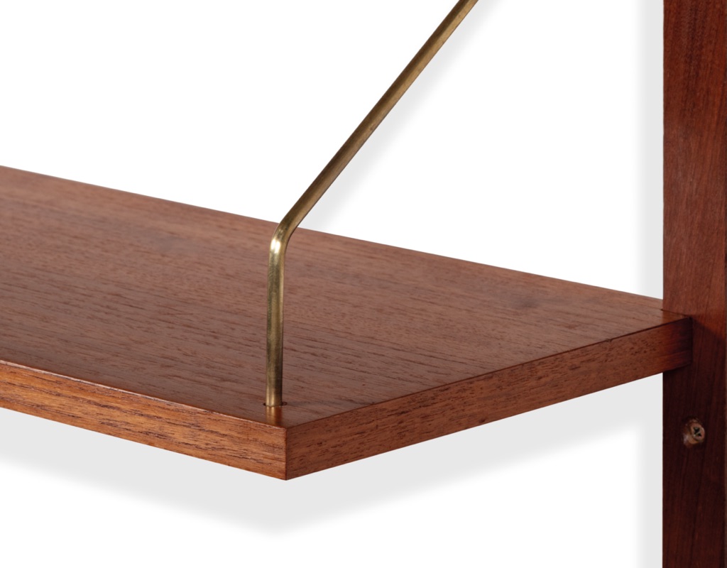Mid century modern Peter Sorensen shelving system Danish vintage 1960 wall mounted Poul Cadovius PS System bookshelf storage teak modular Kai Kristiansen Hans Wegner original Scandinavian design close up metal arm