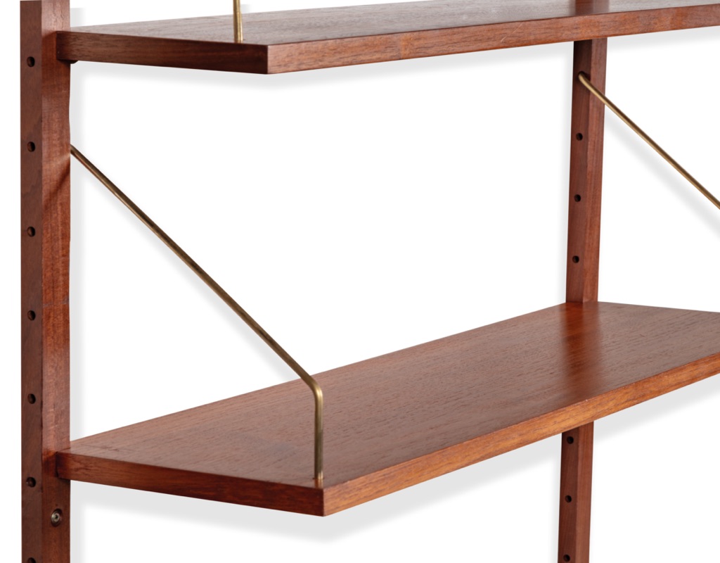Mid century modern Peter Sorensen shelving system Danish vintage 1960 wall mounted Poul Cadovius PS System bookshelf storage teak modular Kai Kristiansen Hans Wegner original Scandinavian design brass arms act as bookends