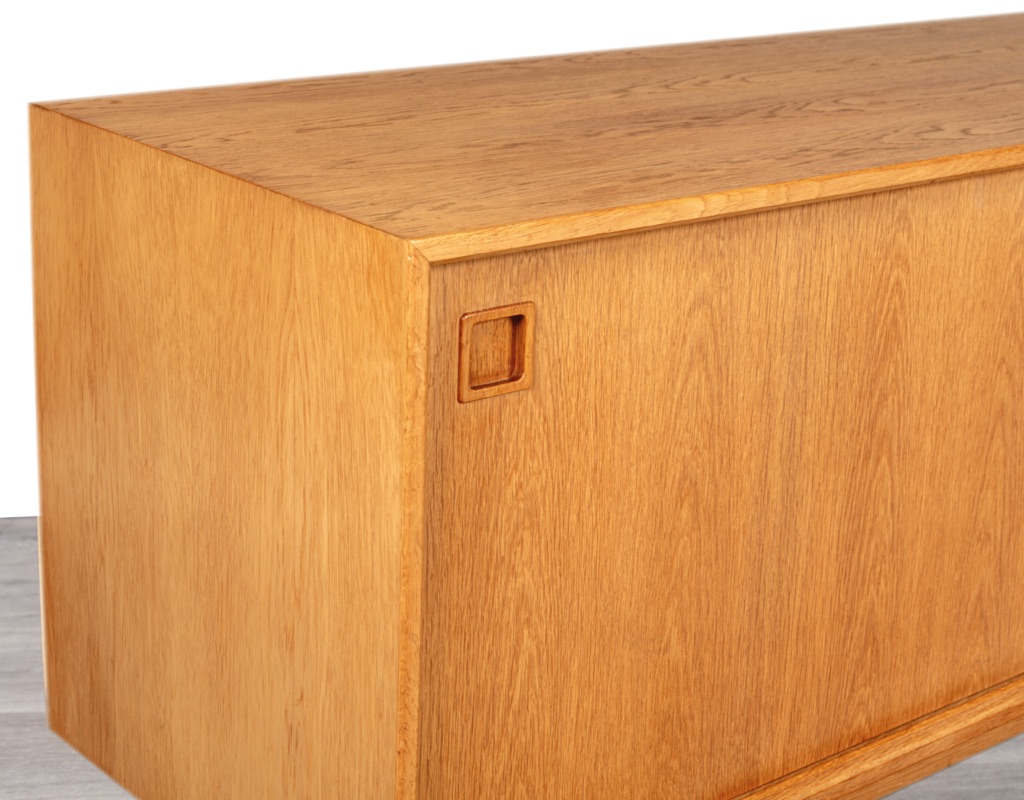 Mid century modern Gunni Omann Omann Jun Mobelfabrik Danish sideboard vintage credenza Model 21 European oak 1960 Denmark storage sliding doors imported furniture Melbourne recessed pulls stretcher base detail