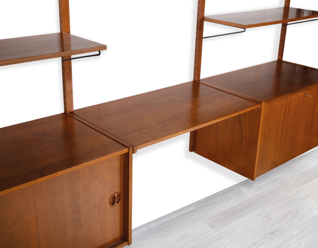 Mid century modern wall mounted shelving system Kurt Ostervig Poul Cadovius Peter Sorensen Kai Kristiansen Danish vintage bookshelf storage teak 1960 desk