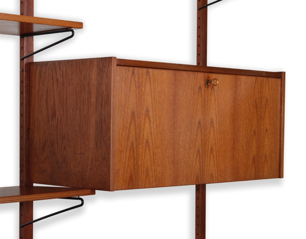 Mid century modern wall mounted shelving system Kurt Ostervig Poul Cadovius Peter Sorensen Kai Kristiansen Danish vintage bookshelf storage teak 1960 metal supports